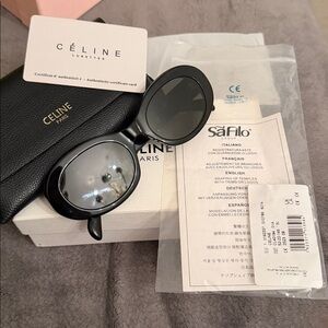 Celine Black Leather Clutch with Gold Logo.SAFILO